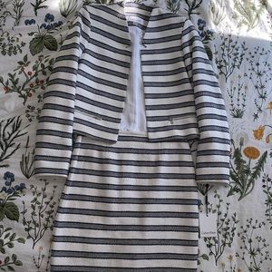 New Calvin Klein suit with tags. The jacket is a size 4 and the skirt is a 6.